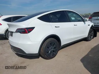 2025 Tesla Model Y Long Range z VIN 7SAYGDED7SA373784, wystawiony jako IAAI lot #41881719 z przebiegiem 1 192 mil mil oraz . Historia ofert i sprzedaży dostępna na DreamBid. Obrazek 4.