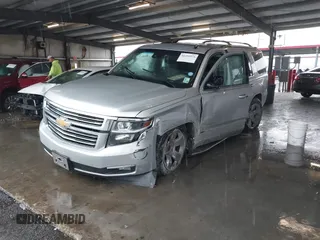 2015 Chevrolet Tahoe LTZ with VIN 1GNSCCKC5FR123099, listed as a IAAI auction lot 41391974 with Not provided miles and . Bid and sale history available at DreamBid. Image 17.