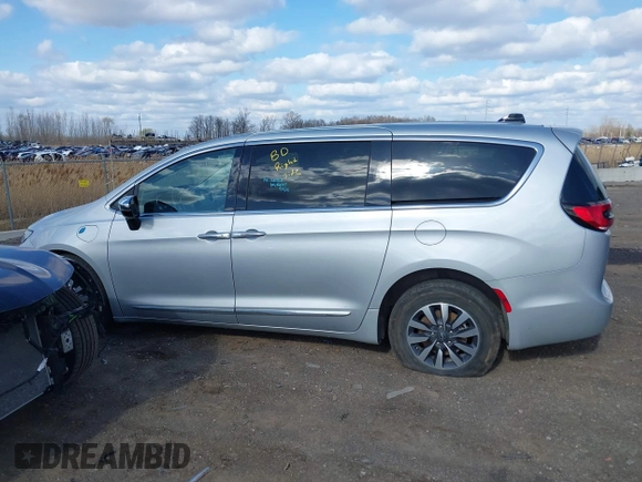 2023 Chrysler Pacifica Hybrid Limited with VIN 2C4RC1S78PR551260, listed as a IAAI auction lot 41992752 with 55,136 mi miles and . Bid and sale history available at DreamBid. Image 14.