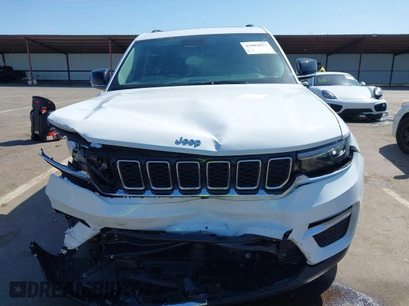 2022 Jeep Grand Cherokee with VIN 1C4RJYB66N8718018, listed as a IAAI auction lot 42002051 with Not provided miles and . Bid and sale history available at DreamBid. Image 11.