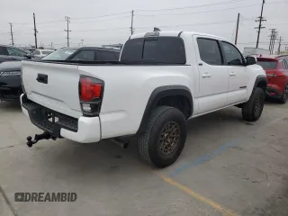 2023 Toyota Tacoma SR с VIN 3TYCZ5AN7PT114941, выставлен на аукционе Copart как лот 60172965 с пробегом 23 116 миль миль и Списание • Salvage title. История ставок и продаж доступна на DreamBid. Изображение 3.