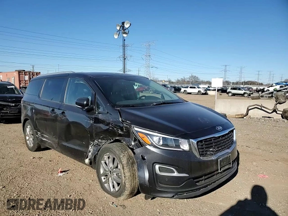 2021 Kia Sedona LX with VIN KNDMB5C1XM6671806, listed as a Copart auction lot 83027514 with 58,884 mi miles and Salvage Title. Bid and sale history available at carsss.com. Image 12.