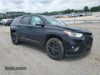 2021 Chevrolet Traverse Premier with VIN 1GNERKKW2MJ262862, listed as a Copart auction lot 58779765 with 76,927 mi miles and Salvage title. Bid and sale history available at DreamBid. Image 4.