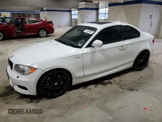 2011 BMW 1 Series 135i with VIN WBAUC9C51BVM09289, listed as a Copart auction lot 52490405 with 171,246 mi miles and Salvage title. Bid and sale history available at DreamBid. Image 1.