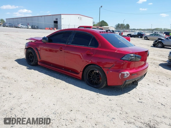 2008 Mitsubishi Lancer Evolution GSR with VIN JA3AW86V38U050561, listed as a IAAI auction lot 41879629 with 104,905 mi miles. Bid and sale history available at carsss.com. Image 3.