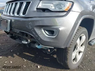 2014 Jeep Grand Cherokee Overland with VIN 1C4RJFCG5EC329377, listed as a IAAI auction lot 40822324 with 106,222 mi miles. Bid and sale history available at carsss.com. Image 19.