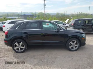 2015 Audi Q3 Prestige with VIN WA1GFCFS2FR009448, listed as a IAAI auction lot 42236056 with 147,644 mi miles and . Bid and sale history available at DreamBid. Image 13.