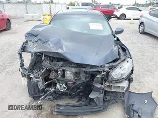 2018 Honda Civic EX with VIN 19XFC2F75JE035935, listed as a IAAI auction lot 41795110 with 92,687 mi miles and . Bid and sale history available at DreamBid. Image 6.