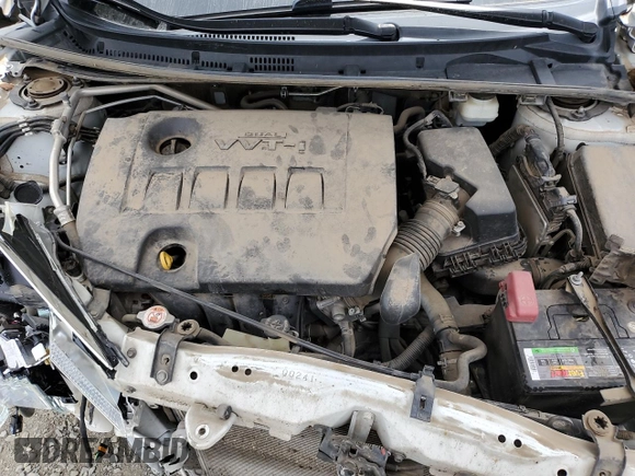 2019 Toyota Corolla L z VIN 5YFBURHE5KP925500, wystawiony jako Copart lot #56594575 z przebiegiem 84 958 mil mil oraz Szkoda całkowita • Salvage title. Historia ofert i sprzedaży dostępna na DreamBid. Obrazek 11.