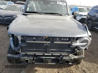 2024 Ford Bronco Big Bend z VIN 1FMDE7BH9RLA85832, wystawiony jako Copart lot #86171994 z przebiegiem 1 196 mil mil oraz Szkoda całkowita • Salvage title. Historia ofert i sprzedaży dostępna na DreamBid. Obrazek 5.