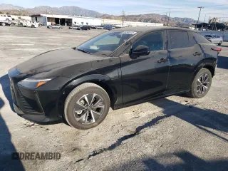 2023 Lexus RZ 450e Premium z VIN JTJAAAAB9PA007621, wystawiony jako Copart lot #80594143 z przebiegiem 7673 mil mil oraz Szkody całkowita. Historia ofert i sprzedaży dostępna na DreamBid. Obrazek 1.
