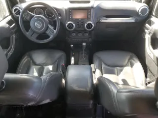 2014 Jeep Wrangler Unlimited Rubicon with VIN 1C4BJWFG0EL199649, listed as a Copart auction lot 47801775 with 141,116 mi miles and Salvage Title. Bid and sale history available at carsss.com. Image 8.