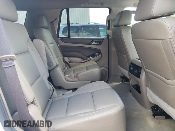 2017 Chevrolet Tahoe LT z VIN 1GNSCBKC2HR135238, wystawiony jako Copart lot #52666245 z przebiegiem 38 524 mil mil oraz Szkoda całkowita • Salvage title. Historia ofert i sprzedaży dostępna na DreamBid. Obrazek 11.