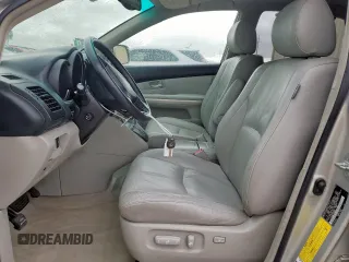2006 Lexus RX 400h with VIN JTJGW31U762000555, listed as a Copart auction lot 54873185 with 191,579 mi miles and Salvage title. Bid and sale history available at DreamBid. Image 7.