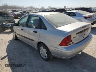 2003 Ford Focus LX с VIN 1FAFP33P63W187283, выставлен на аукционе Copart как лот 48803575 с пробегом Не указан миль и Списание • Salvage title. История ставок и продаж доступна на DreamBid. Изображение 2.