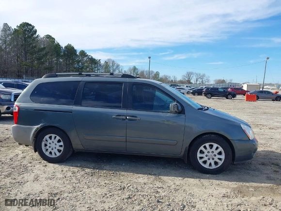 2006 Kia Sedona LX with VIN KNDMB233X66063982, listed as a IAAI auction lot 41547081 with 264,969 mi miles. Bid and sale history available at carsss.com. Image 13.