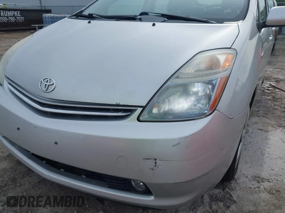2007 Toyota Prius z VIN JTDKB20U173284944, wystawiony jako IAAI lot #42343170 z przebiegiem 172 776 mil mil oraz . Historia ofert i sprzedaży dostępna na DreamBid. Obrazek 6.