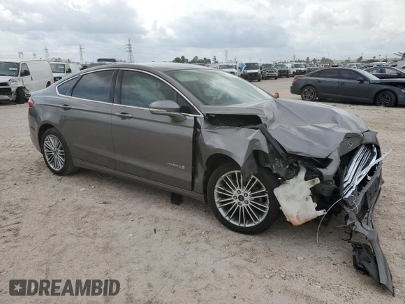 2014 Ford Fusion SE Hybrid with VIN 3FA6P0LU8ER343625, listed as a Copart auction lot 54844285 with 181,631 mi miles and Salvage Title. Bid and sale history available at DreamBid. Image 4.