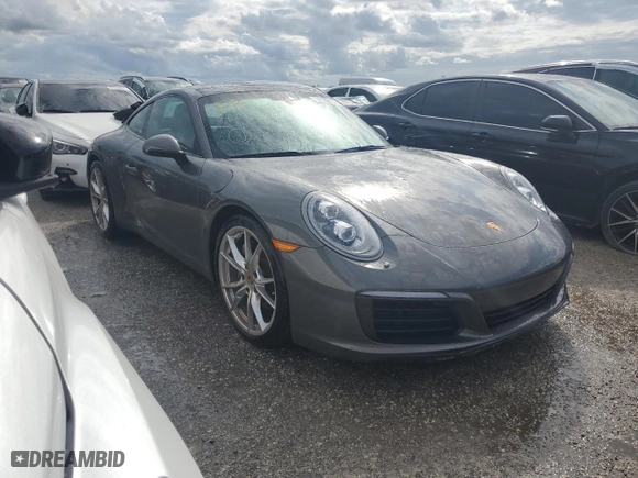 2017 Porsche 911 Carrera with VIN WP0AA2A93HS107859, listed as a Copart auction lot 74300154 with 0 mi miles and Non Repairable. Bid and sale history available at carsss.com. Image 4.