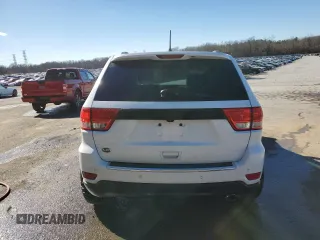 2013 Jeep Grand Cherokee Overland with VIN 1C4RJECG1DC525986, listed as a Copart auction lot 42040775 with 148,784 mi miles and Salvage Title. Bid and sale history available at carsss.com. Image 6.