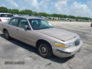 1997 Mercury Grand Marquis GS z VIN 2MELM74W6VX735842, wystawiony jako IAAI lot #42503257 z przebiegiem 201 644 mil mil oraz . Historia ofert i sprzedaży dostępna na DreamBid. Obrazek 1.