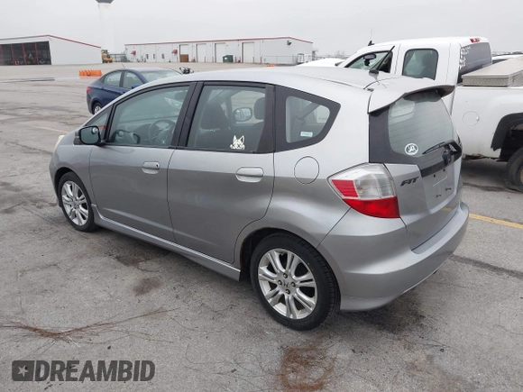 2009 Honda Fit Sport with VIN JHMGE88469S063030, listed as a IAAI auction lot 42064670 with 156,791 mi miles. Bid and sale history available at carsss.com. Image 3.