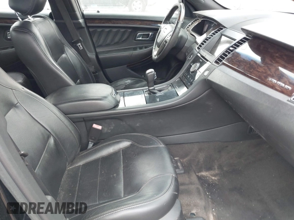 2017 Ford Taurus Limited z VIN 1FAHP2F80HG104374, wystawiony jako IAAI lot #42283261 z przebiegiem 169 378 mil mil oraz . Historia ofert i sprzedaży dostępna na DreamBid. Obrazek 5.