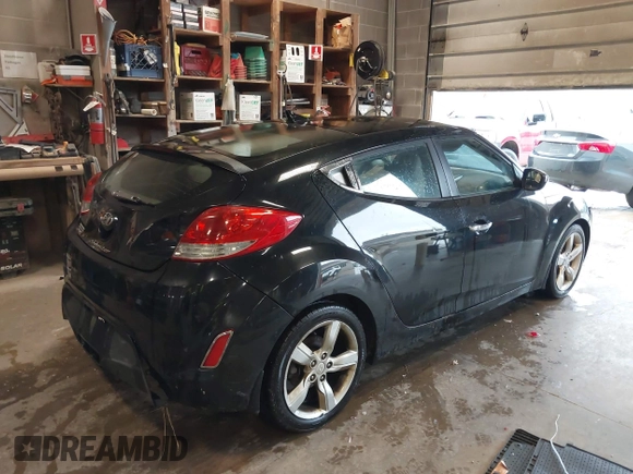 2012 Hyundai Veloster w/Gray Int с VIN KMHTC6AD3CU020230, выставлен на аукционе IAAI как лот 42307281 с пробегом 185 002 миль миль и . История ставок и продаж доступна на DreamBid. Изображение 4.