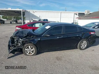 2016 Kia Optima LX with VIN 5XXGT4L31GG022844, listed as a IAAI auction lot 41240100 with 121,586 mi miles and . Bid and sale history available at DreamBid. Image 14.
