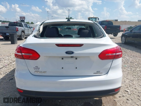 2015 Ford Focus SE with VIN 1FADP3F2XFL335884, listed as a IAAI auction lot 42582740 with 102,036 mi miles and . Bid and sale history available at DreamBid. Image 16.