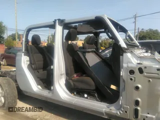 2022 Jeep Gladiator Willys with VIN 1C6HJTAG0NL131004, listed as a IAAI auction lot 40307060 with Not provided miles and . Bid and sale history available at DreamBid. Image 14.