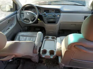 2003 Honda Odyssey EX-L with VIN 5FNRL189X3B114181, listed as a Copart auction lot 54316105 with 103,214 mi miles and Salvage Title. Bid and sale history available at DreamBid. Image 8.