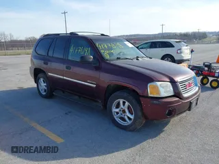 2006 GMC Envoy SLE with VIN 1GKDT13S762328884, listed as a IAAI auction lot 41778198 with 1 mi miles. Bid and sale history available at carsss.com. Image 1.