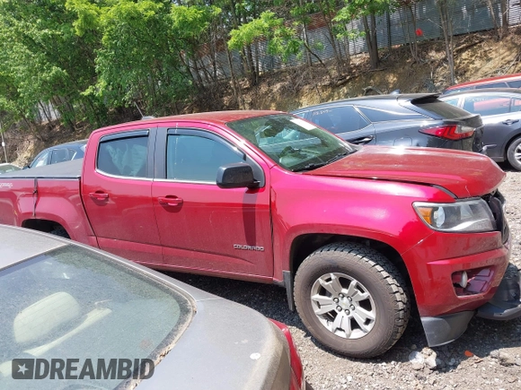 2018 Chevrolet Colorado 4WD LT z VIN 1GCGTCENXJ1214811, wystawiony jako IAAI lot #42418878 z przebiegiem 80 453 mil mil oraz . Historia ofert i sprzedaży dostępna na DreamBid. Obrazek 13.
