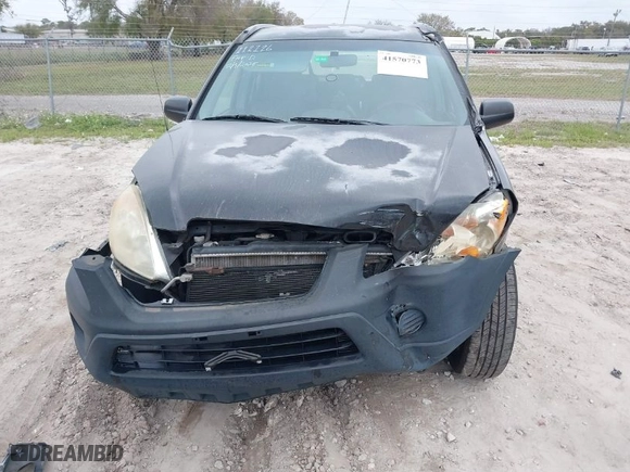 2005 Honda CR-V LX with VIN JHLRD68565C016677, listed as a IAAI auction lot 41570773 with 192,932 mi miles. Bid and sale history available at carsss.com. Image 6.