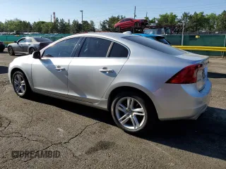 2014 Volvo S60 T5 z VIN YV1612FS0E1292871, wystawiony jako Copart lot #60105755 z przebiegiem 122 279 mil mil oraz Czysty tytuł • Clean title. Historia ofert i sprzedaży dostępna na DreamBid. Obrazek 2.