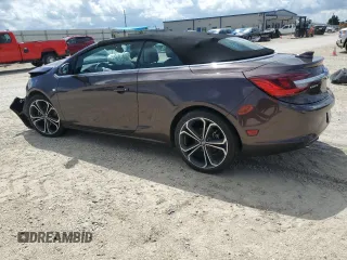 2016 Buick Cascada Premium с VIN W04WT3N59GG155097, выставлен на аукционе Copart как лот 71072644 с пробегом Не указан миль и Списание • Salvage title. История ставок и продаж доступна на DreamBid. Изображение 2.