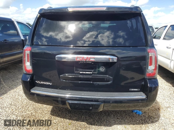 2020 GMC Yukon Denali with VIN 1GKS1CKJXLR181612, listed as a Copart auction lot 74451364 with 52,761 mi miles and Salvage Title. Bid and sale history available at carsss.com. Image 6.