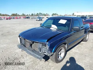 2002 GMC Sonoma SL Fleet with VIN 1GTCS19W128244099, listed as a IAAI auction lot 41090001 with 153,048 mi miles. Bid and sale history available at carsss.com. Image 6.