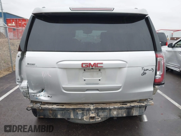 2015 GMC Yukon SLT with VIN 1GKS2BKCXFR131919, listed as a IAAI auction lot 41664827 with 149,398 mi miles. Bid and sale history available at carsss.com. Image 17.