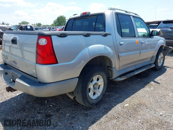 2003 Ford Explorer Sport Trac XLS z VIN 1FMZU67E13UA18239, wystawiony jako IAAI lot #39808663 z przebiegiem 176 641 mil mil oraz . Historia ofert i sprzedaży dostępna na DreamBid. Obrazek 4.