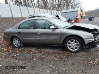 2003 Mercury Sable LS Premium with VIN 1MEFM55S13G612515, listed as a IAAI auction lot 41837589 with 62,173 mi miles and . Bid and sale history available at DreamBid. Image 13.