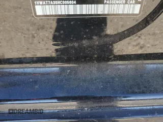 2017 Volkswagen Passat S z VIN 1VWAT7A35HC005604, wystawiony jako Copart lot #49499095 z przebiegiem 124 618 mil mil oraz Szkoda całkowita • Salvage title. Historia ofert i sprzedaży dostępna na DreamBid. Obrazek 14.