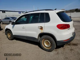 2013 Volkswagen Tiguan with VIN WVGHV7AX5DW527541, listed as a Copart auction lot 52641605 with 317,783 mi miles and Clean Title. Bid and sale history available at DreamBid. Image 2.