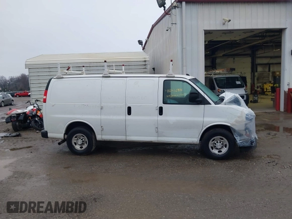 2018 Chevrolet Express Cargo with VIN 1GCWGAFG7J1178161, listed as a IAAI auction lot 41242918 with 119,323 mi miles and . Bid and sale history available at DreamBid. Image 13.