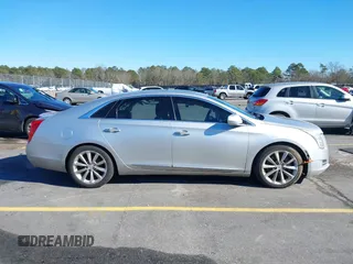 2013 Cadillac XTS Premium z VIN 2G61S5S35D9209252, wystawiony jako IAAI lot #41275066 z przebiegiem 132 311 mil mil oraz . Historia ofert i sprzedaży dostępna na DreamBid. Obrazek 14.