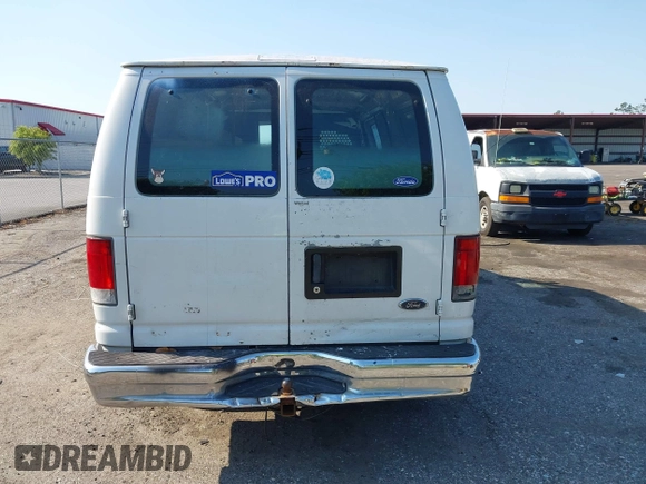 1999 Ford Econoline Cargo with VIN 1FTRE1420XHA34056, listed as a IAAI auction lot 41998411 with 236,267 mi miles. Bid and sale history available at carsss.com. Image 16.