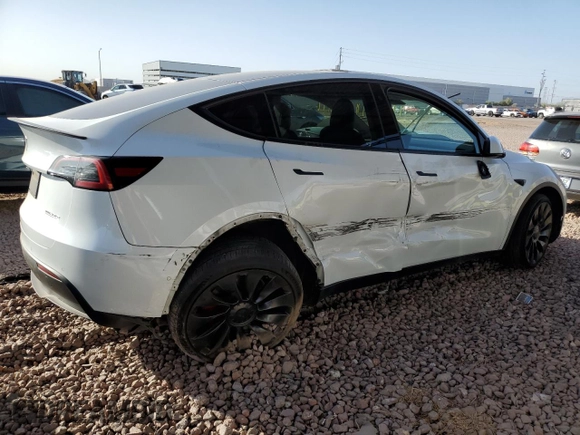 2022 Tesla Model Y Performance with VIN 7SAYGDEF7NF337571, listed as a Copart auction lot 45050805 with Not Provided miles and Salvage Title. Bid and sale history available at DreamBid. Image 3.