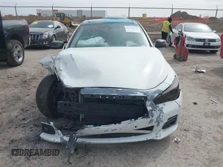 2015 Infiniti Q50 z VIN JN1BV7APXFM335981, wystawiony jako IAAI lot #41718555 z przebiegiem 83 918 mil mil oraz . Historia ofert i sprzedaży dostępna na DreamBid. Obrazek 11.