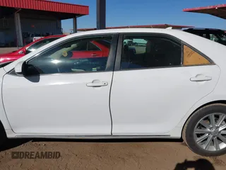 2014 Toyota Camry SE with VIN 4T1BK1FK2EU543220, listed as a IAAI auction lot 41416785 with 198,011 mi miles. Bid and sale history available at carsss.com. Image 13.